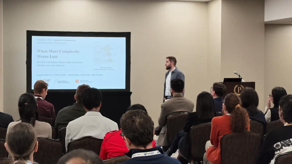 Giuseppe presenting When More Complexity Means Less to the audience at ACR 2026 in Chicago